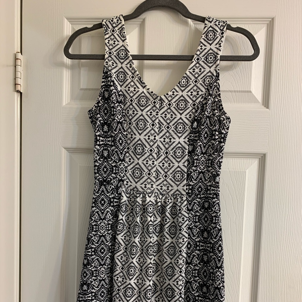 Black and white dress with cutout on the back.